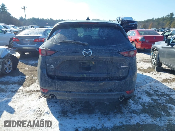2020 Mazda CX-5 Grand Touring with VIN JM3KFBDM7L1807685, listed as a IAAI auction lot 41392313 with 91,729 mi miles and . Bid and sale history available at carsss.com. Image 16.