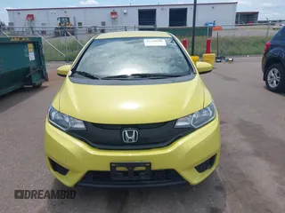 2015 Honda Fit LX z VIN 3HGGK5H58FM768970, wystawiony jako IAAI lot #42760686 z przebiegiem 89 531 mil mil oraz . Historia ofert i sprzedaży dostępna na DreamBid. Obrazek 12.