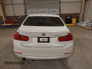 2014 BMW 3 Series 328d with VIN WBA3D3C57EK156586, listed as a IAAI auction lot 41328159 with 233,080 mi miles and . Bid and sale history available at DreamBid. Image 16.