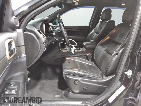 2014 Jeep Grand Cherokee Overland with VIN 1C4RJFCGXEC153250, listed as a Copart auction lot 51327195 with 132,282 mi miles and Clean Title. Bid and sale history available at DreamBid. Image 7.