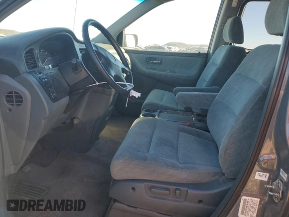 1999 Honda Odyssey EX with VIN 2HKRL1860XH541737, listed as a Copart auction lot 88897965 with 112,164 mi miles and Salvage title. Bid and sale history available at DreamBid. Image 7.