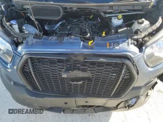 2024 Ford Transit Cargo with VIN 1FTRU8XG8RKA15196, listed as a Copart auction lot 84198984 with 12,267 mi miles and Salvage Title. Bid and sale history available at DreamBid. Image 13.