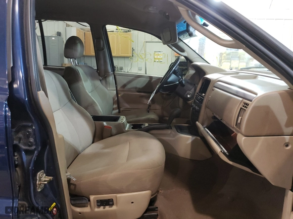 2002 Jeep Grand Cherokee Laredo with VIN 1J8GW48S92C197903, listed as a Copart auction lot 70524292 with 152,286 mi miles and Non Repairable. Bid and sale history available at carsss.com. Image 5.