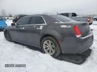 2015 Chrysler 300 C with VIN 2C3CCAET3FH802449, listed as a Copart auction lot 44647285 with 123,358 mi miles and Salvage Title. Bid and sale history available at DreamBid. Image 2.