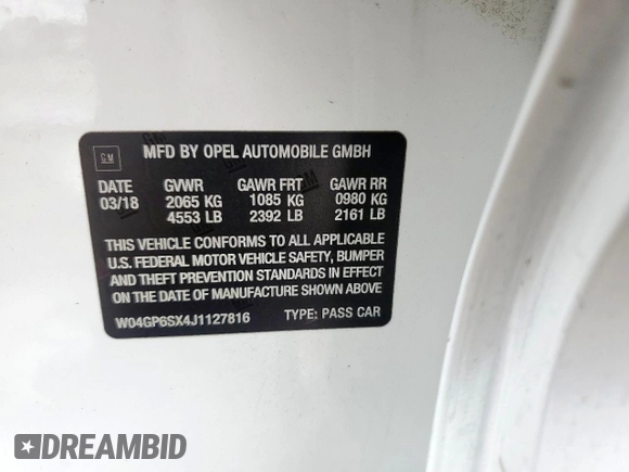 2018 Buick Regal Essence with VIN W04GP6SX4J1127816, listed as a Copart auction lot 58793905 with 86,501 mi miles and Salvage title. Bid and sale history available at DreamBid. Image 12.