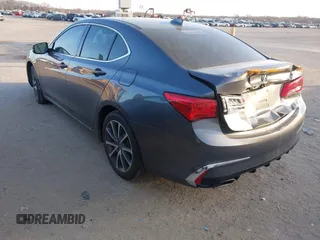 2018 Acura TLX with VIN 19UUB2F34JA008883, listed as a IAAI auction lot 41386586 with 57,928 mi miles. Bid and sale history available at carsss.com. Image 3.