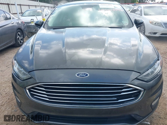 2019 Ford Fusion SE with VIN 3FA6P0HD7KR169700, listed as a IAAI auction lot 42064494 with 56,463 mi miles and . Bid and sale history available at DreamBid. Image 12.