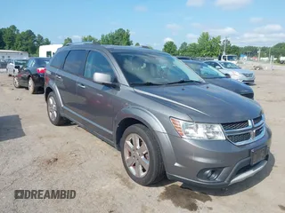 2012 Dodge Journey Crew with VIN 3C4PDCDG9CT199567, listed as a IAAI auction lot 42738030 with 140,864 mi miles and . Bid and sale history available at DreamBid. Image 1.