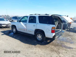 2003 GMC Yukon SLT with VIN 1GKEC13Z13J197955, listed as a IAAI auction lot 41586841 with 208,752 mi miles. Bid and sale history available at carsss.com. Image 3.