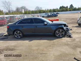 2017 Audi A4 Premium Plus z VIN WAUENAF46HN023687, wystawiony jako IAAI lot #41804603 z przebiegiem 117 020 mil mil oraz . Historia ofert i sprzedaży dostępna na DreamBid. Obrazek 14.