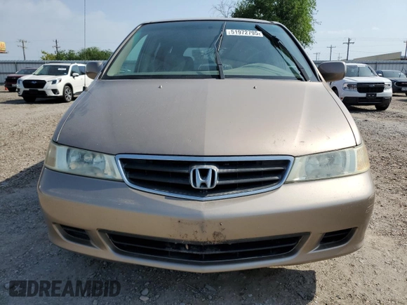 2004 Honda Odyssey EX-L with VIN 5FNRL18934B107378, listed as a Copart auction lot 51972795 with 186,043 mi miles and Salvage Title. Bid and sale history available at DreamBid. Image 5.