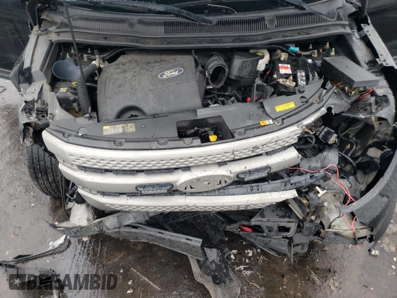 2011 Ford Explorer z VIN 1FMHK7B82BGA90332, wystawiony jako Copart lot #65776774 z przebiegiem Nie podano mil oraz Szkoda całkowita • Salvage title. Historia ofert i sprzedaży dostępna na DreamBid. Obrazek 13.