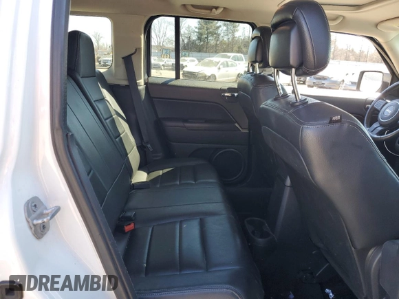 2014 Jeep Patriot Latitude with VIN 1C4NJPFA9ED758298, listed as a Copart auction lot 47253425 with 139,322 mi miles and Salvage title. Bid and sale history available at DreamBid. Image 11.