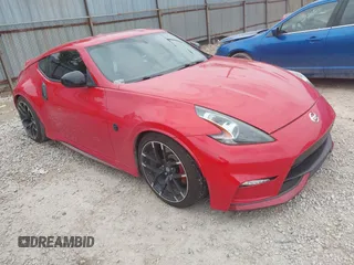 2016 Nissan 370Z Sport z VIN JN1AZ4EH7GM931035, wystawiony jako IAAI lot #42311165 z przebiegiem 83 947 mil mil oraz . Historia ofert i sprzedaży dostępna na DreamBid. Obrazek 1.