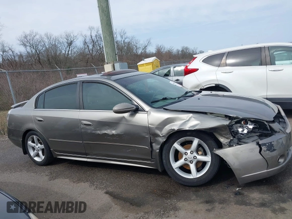2006 Nissan Altima SL z VIN 1N4BL11D96C251717, wystawiony jako IAAI lot #41566215 z przebiegiem 189 431 mil mil oraz . Historia ofert i sprzedaży dostępna na DreamBid. Obrazek 13.