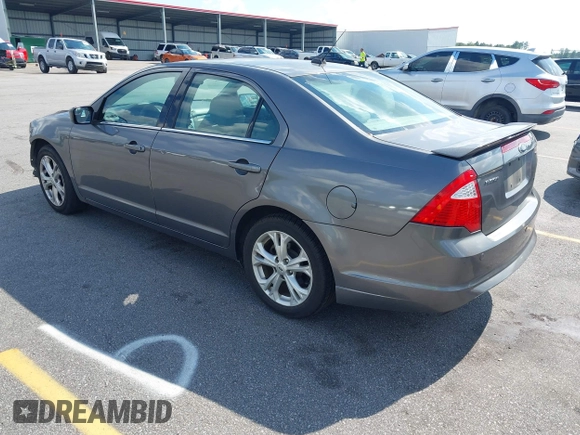 2012 Ford Fusion SE with VIN 3FAHP0HA0CR102548, listed as a IAAI auction lot 42628344 with 166,597 mi miles and . Bid and sale history available at DreamBid. Image 3.