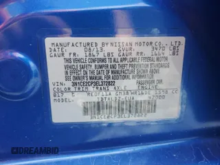 2014 Nissan Note SV with VIN 3N1CE2CP3EL372822, listed as a Copart auction lot 53089685 with 114,921 mi miles and Salvage title. Bid and sale history available at DreamBid. Image 14.