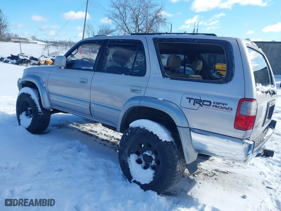 1998 Toyota 4Runner Limited with VIN JT3HN87R2W0184698, listed as a IAAI auction lot 41710285 with 176,068 mi miles. Bid and sale history available at carsss.com. Image 3.