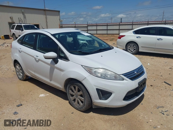 2012 Ford Fiesta SE with VIN 3FADP4BJ8CM161701, listed as a IAAI auction lot 42140579 with 59,496 mi miles. Bid and sale history available at carsss.com. Image 1.