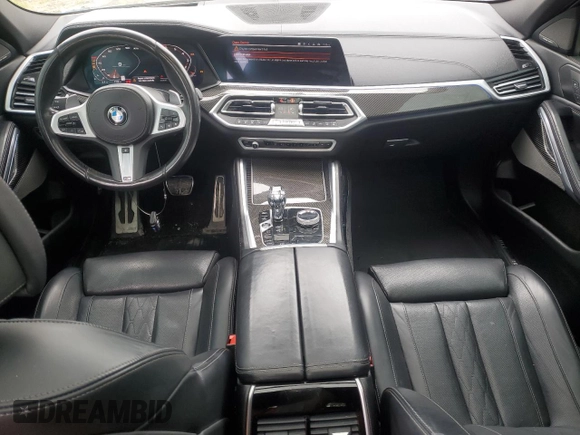 2021 BMW X6 M50i z VIN 5UXCY8C04M9D98591, wystawiony jako Copart lot #60606155 z przebiegiem 90 639 mil mil oraz Czysty tytuł • Clean title. Historia ofert i sprzedaży dostępna na DreamBid. Obrazek 8.