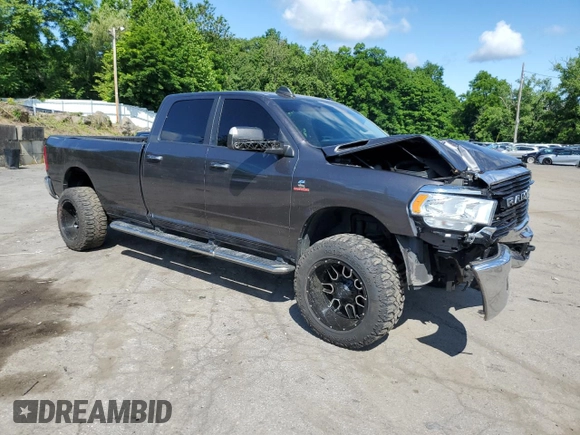 2019 Ram 2500 Big Horn with VIN 3C6UR5JLXKG606957, listed as a Copart auction lot 57713014 with 102,399 mi miles and Salvage Title. Bid and sale history available at carsss.com. Image 4.