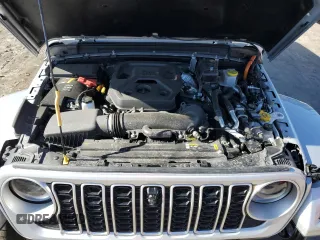 2024 Jeep Wrangler Sahara with VIN 1C4RJXP63RW195206, listed as a Copart auction lot 48784595 with 10,737 mi miles and Salvage Title. Bid and sale history available at DreamBid. Image 12.