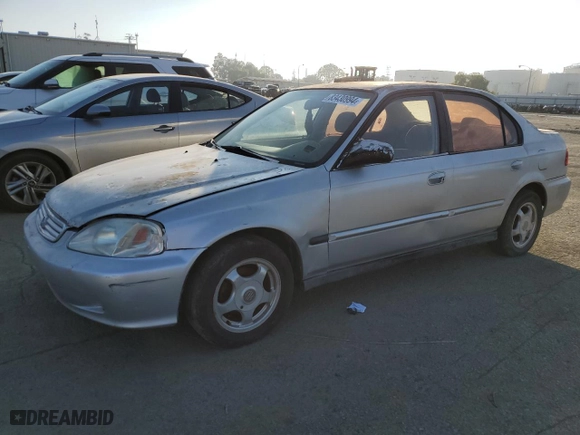 2000 Honda Civic VP with VIN 2HGEJ6612YH563761, listed as a Copart auction lot 83430994 with 170,515 mi miles and Salvage Title. Bid and sale history available at carsss.com. Image 1.