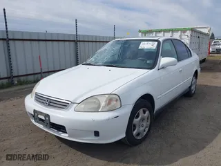 1999 Honda Civic EX with VIN 2HGEJ8648XH526377, listed as a IAAI auction lot 41517330 with 167,375 mi miles. Bid and sale history available at carsss.com. Image 2.