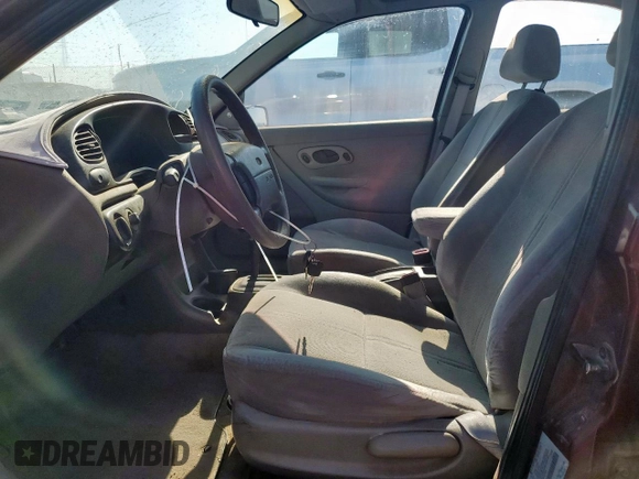 1999 Ford Contour LX with VIN 1FAFP66L2XK167281, listed as a Copart auction lot 64839335 with 256,227 mi miles and Clean title. Bid and sale history available at DreamBid. Image 8.