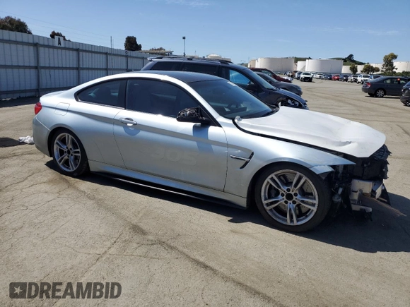 2015 BMW M4 with VIN WBS3R9C52FK334020, listed as a Copart auction lot 51867985 with 95,369 mi miles and Salvage title. Bid and sale history available at DreamBid. Image 4.