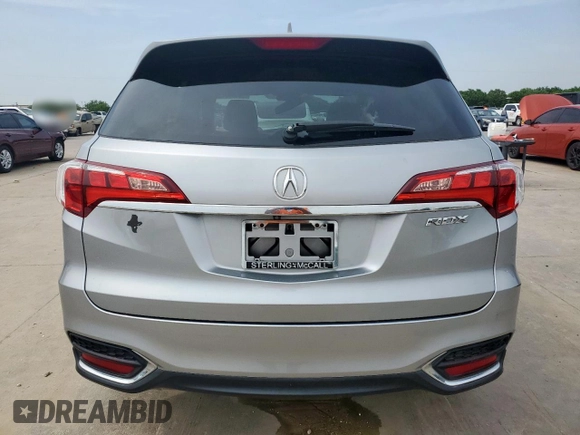 2018 Acura RDX with VIN 5J8TB3H34JL011396, listed as a Copart auction lot 56889575 with 69,300 mi miles and Salvage title. Bid and sale history available at DreamBid. Image 6.