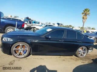 2014 BMW M5 with VIN WBSFV9C56ED097611, listed as a IAAI auction lot 41845196 with 72,215 mi miles. Bid and sale history available at carsss.com. Image 14.
