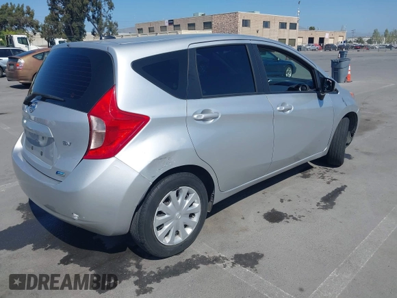 2015 Nissan Note SV with VIN 3N1CE2CP3FL421485, listed as a IAAI auction lot 42217326 with 110,525 mi miles and . Bid and sale history available at DreamBid. Image 4.