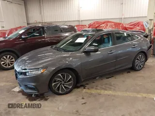2022 Honda Insight Touring with VIN 19XZE4F96NE008687, listed as a IAAI auction lot 41653624 with 32,663 mi miles and . Bid and sale history available at DreamBid. Image 2.