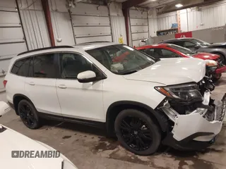 2022 Honda Pilot Special Edition with VIN 5FNYF6H27NB105041, listed as a IAAI auction lot 41916708 with 15,848 mi miles and . Bid and sale history available at DreamBid. Image 14.