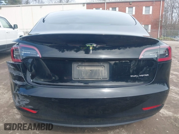 2022 Tesla Model 3 Long Range with VIN 5YJ3E1EBXNF177128, listed as a IAAI auction lot 41966089 with 75,140 mi miles and . Bid and sale history available at DreamBid. Image 16.