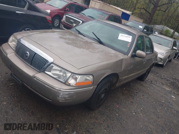 2004 Mercury Grand Marquis GS with VIN 2MEFM74W24X604421, listed as a IAAI auction lot 41929099 with 200,500 mi miles and . Bid and sale history available at DreamBid. Image 2.