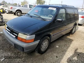 1991 Dodge Caravan z VIN 2B4GK55R6MR136865, wystawiony jako Copart lot #83209824 z przebiegiem 44 931 mil mil oraz Tytuł czysty. Historia ofert i sprzedaży dostępna na DreamBid. Obrazek 1.
