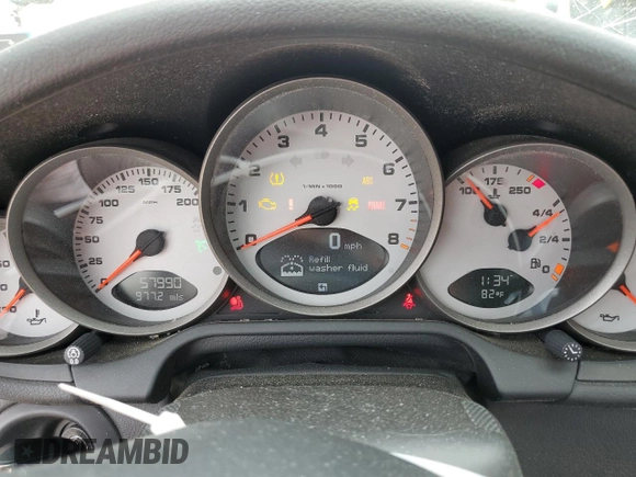 2009 Porsche 911 Carrera S with VIN WP0CB29919S755552, listed as a Copart auction lot 59403325 with 57,990 mi miles and Salvage title. Bid and sale history available at DreamBid. Image 9.