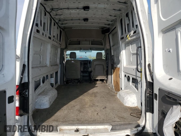 2021 Nissan NV Cargo SV z VIN 1N6BF0LY5MN811081, wystawiony jako Copart lot #57692305 z przebiegiem 249 132 mil mil oraz Szkody całkowita. Historia ofert i sprzedaży dostępna na DreamBid. Obrazek 10.