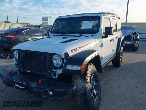 2022 Jeep Wrangler Unlimited Rubicon with VIN 1C4HJXFN4NW123803, listed as a IAAI auction lot 40994742 with 36,156 mi miles and . Bid and sale history available at DreamBid. Image 17.