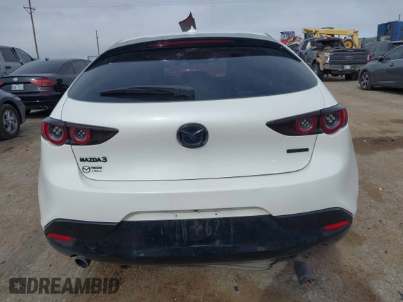 2021 Mazda 3 Premium with VIN JM1BPAML0M1302385, listed as a IAAI auction lot 41397521 with 55,907 mi miles and . Bid and sale history available at DreamBid. Image 15.