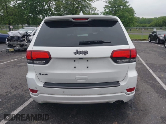 2021 Jeep Grand Cherokee 80th Anniversary with VIN 1C4RJFBG2MC568028, listed as a IAAI auction lot 42381104 with 51,027 mi miles and . Bid and sale history available at DreamBid. Image 16.