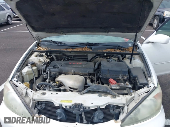 2004 Toyota Camry LE with VIN 4T1BE32K64U277496, listed as a IAAI auction lot 42130199 with 250,972 mi miles. Bid and sale history available at carsss.com. Image 10.