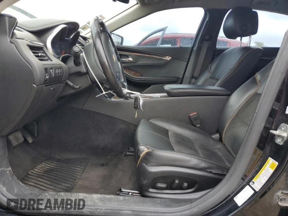 2014 Chevrolet Impala LT z VIN 2G1125S3XE9234719, wystawiony jako Copart lot #58139885 z przebiegiem 120 561 mil mil oraz Szkoda całkowita • Salvage title. Historia ofert i sprzedaży dostępna na DreamBid. Obrazek 7.
