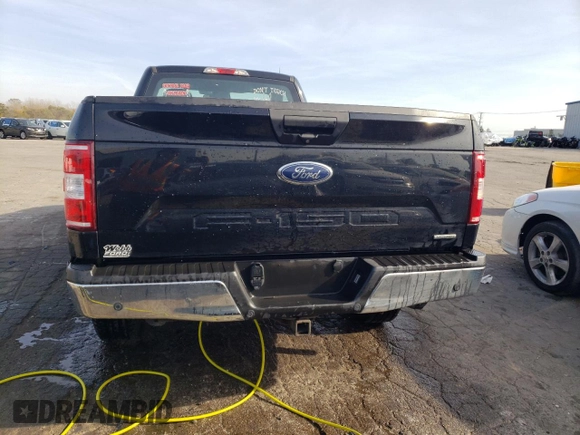 2018 Ford F-150 XL with VIN 1FTMF1EP0JKC60951, listed as a Copart auction lot 77759594 with 152,604 mi miles and Salvage title. Bid and sale history available at DreamBid. Image 6.