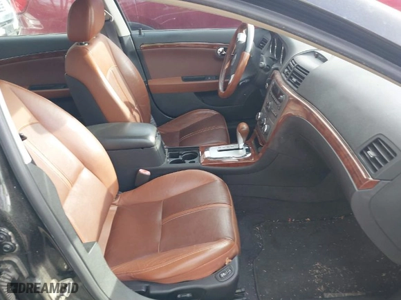 2009 Saturn Aura XR with VIN 1G8ZV57B19F181529, listed as a IAAI auction lot 41865101 with 214,984 mi miles. Bid and sale history available at carsss.com. Image 5.