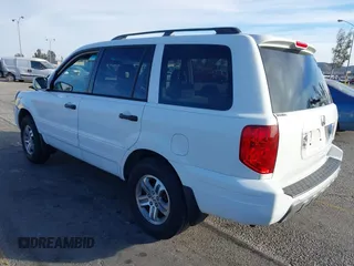 2005 Honda Pilot EX with VIN 5FNYF18475B060655, listed as a IAAI auction lot 41381619 with 142,680 mi miles and . Bid and sale history available at DreamBid. Image 3.