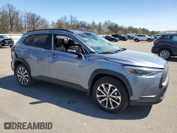 2022 Toyota Corolla Cross XLE z VIN 7MUDAABGXNV042300, wystawiony jako Copart lot #55034815 z przebiegiem 10 457 mil mil oraz Szkoda całkowita • Salvage title. Historia ofert i sprzedaży dostępna na DreamBid. Obrazek 4.