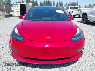 2021 Tesla Model 3 Long Range with VIN 5YJ3E1EB6MF054361, listed as a IAAI auction lot 42105247 with 58,986 mi miles and . Bid and sale history available at carsss.com. Image 12.